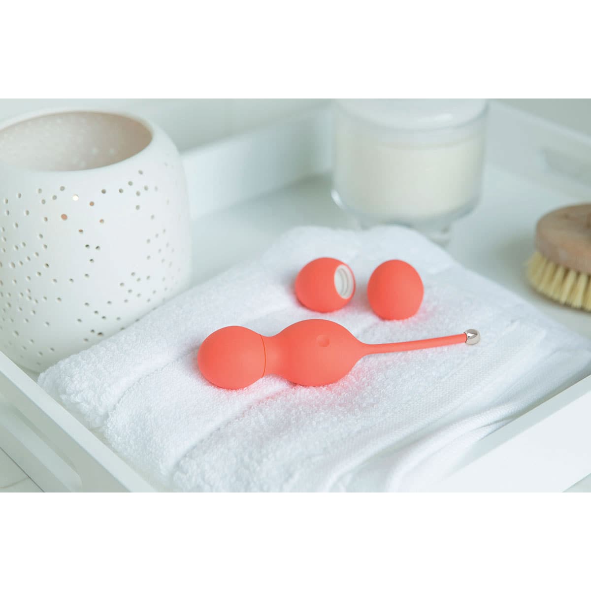 Buy We Vibe Bloom Coral kegel exercise device for pelvic floor muscle strengthening.