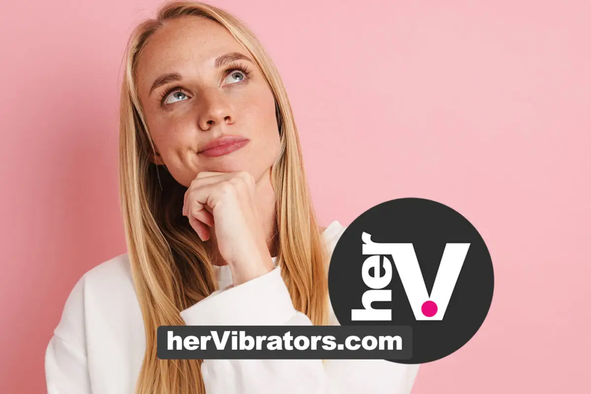 Woman on pink background representing tips for pleasuring a large clitoris, big clit sensitivity, body confidence, and sexual wellness.