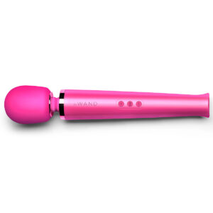 Le Wand vibrator Magenta shown in hand for scale
