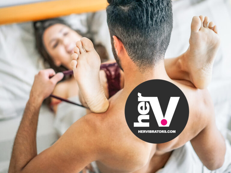 Couple enjoying a sensual variation of the missionary position sex style with intimacy, passion, and eye contact.