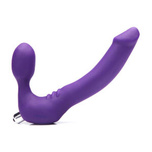 Violet Tantus vibrator Strapless Classic shown in hand for scale