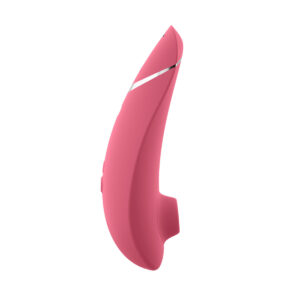 Womanizer vibrator Premium 2 Raspberry shown in hand for scale