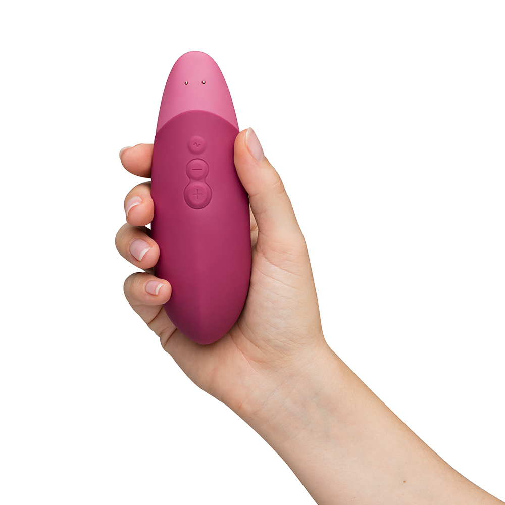 Product image of the Pink Womanizer vibrator on clean background