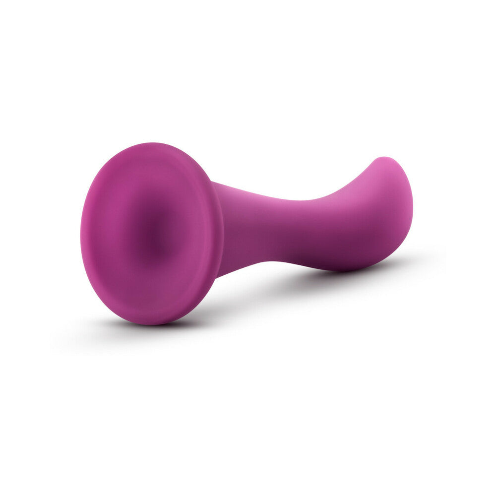 6.25 inch Dildo by Blush in Hot Pink Magenta Fuchsia shown for pegging Her or Him