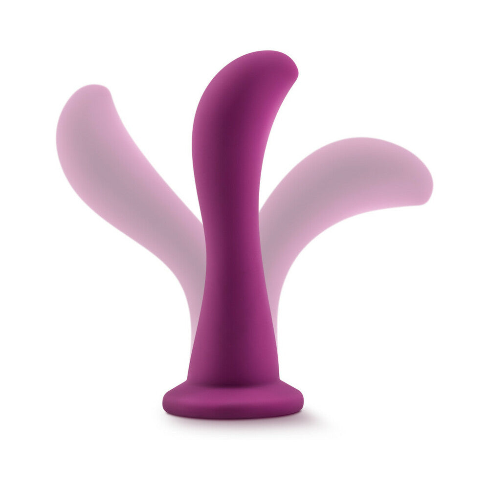 6.25 inch Dildo by Blush in Hot Pink Magenta Fuchsia displayed for pegging Him or Her