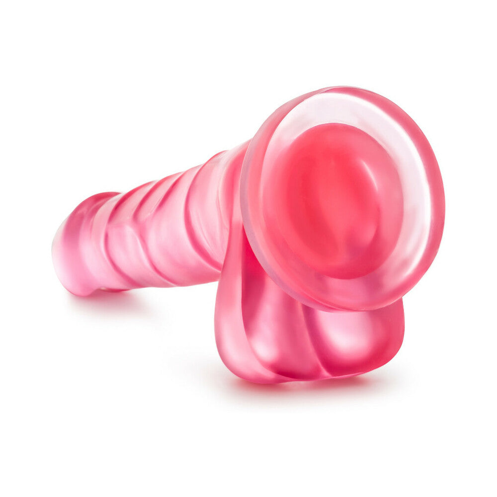 7 inch Dildo by Blush in Hot Pink Magenta Fuchsia shown for pegging Her or Him