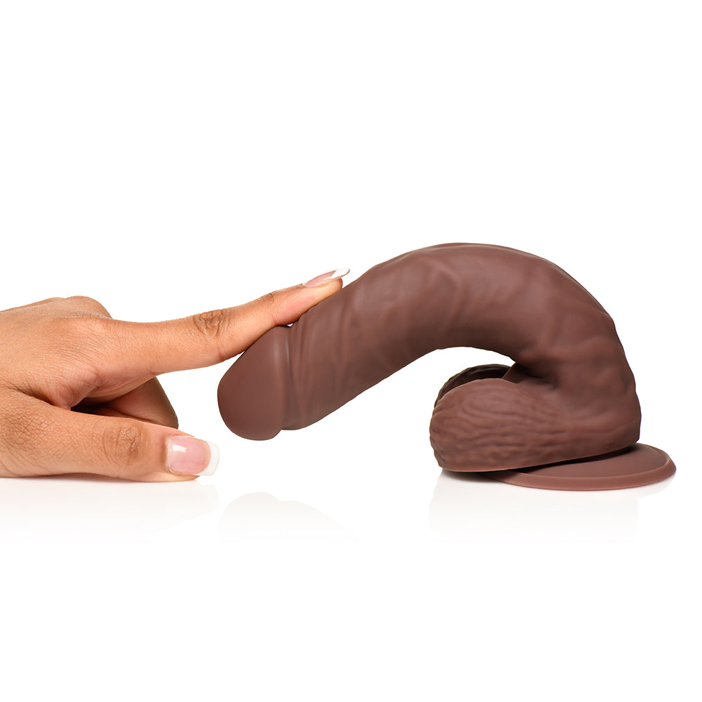 7 inch Dildo by Curve Novelties in Brown Chocolate Cocoa displayed for pegging Him or Her
