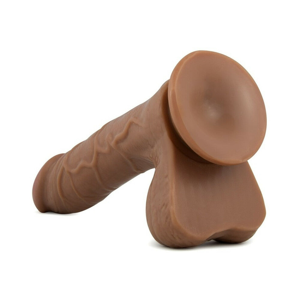 8.5 inch Dildo by Blush in Tan Light Brown Mocha shown for pegging Her or Him