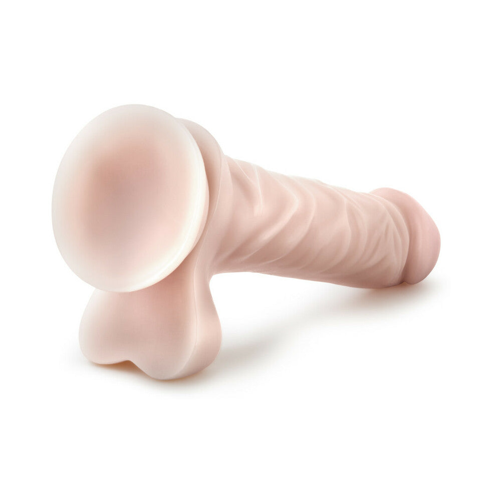 9 inch Dildo by Blush in Vanilla Ivory Beige shown for pegging Her or Him