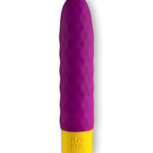 Purple ROMP vibrator Beat shown in hand for scale