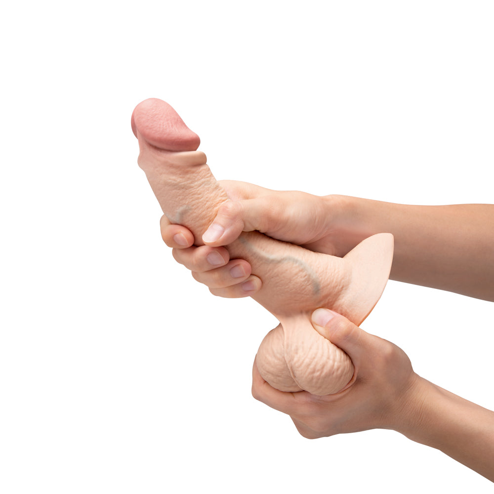 8 inch Dildo by b-Vibe in  displayed for pegging Him or Her