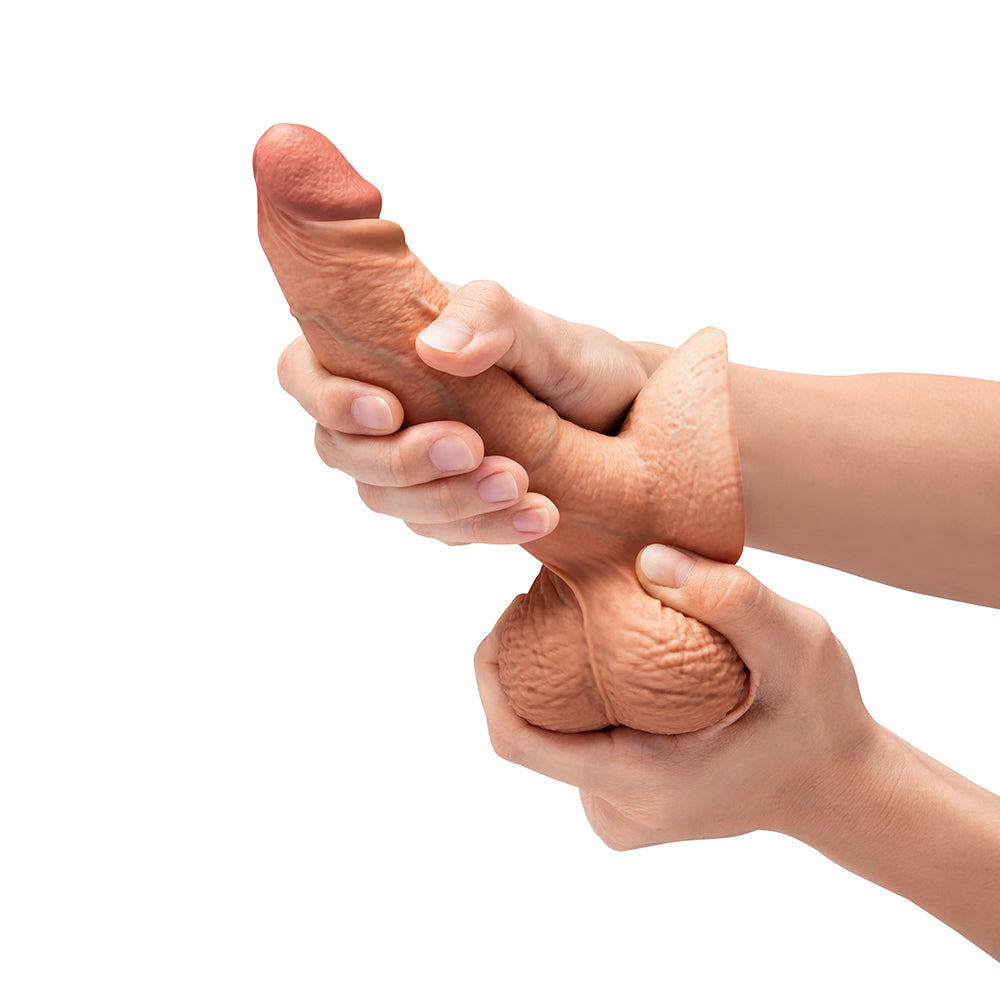 Dildo by b-Vibe in Tan Light Brown Mocha displayed for pegging Him or Her