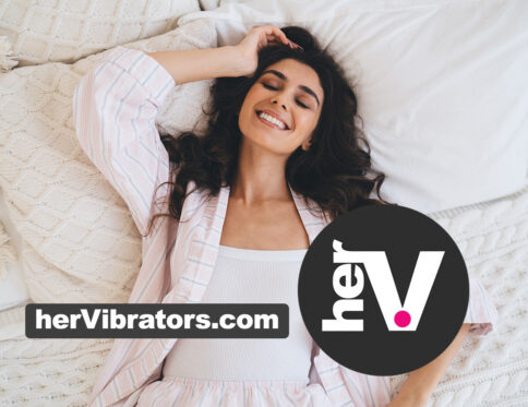 Best vibrators for her guide 2026 with a woman smiling in cozy bedding