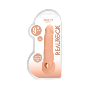 Beige Shots vibrator RealRock 9in Penis Extender Sling shown in hand for scale