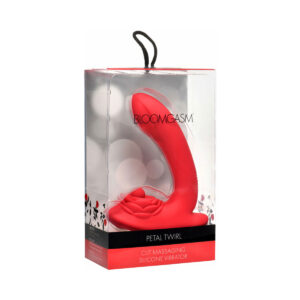 XR Brands vibrator Bloomgasm Petal Twirl Clit Massag shown in hand for scale